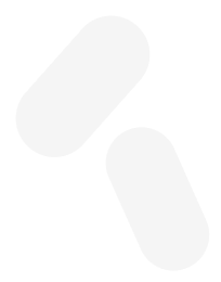 Two white capsule pills arranged diagonally on a black background, suggesting medication icon